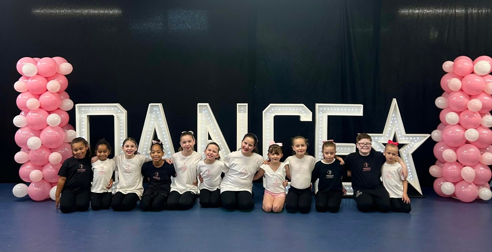 Pinnacle dancers celebrating together