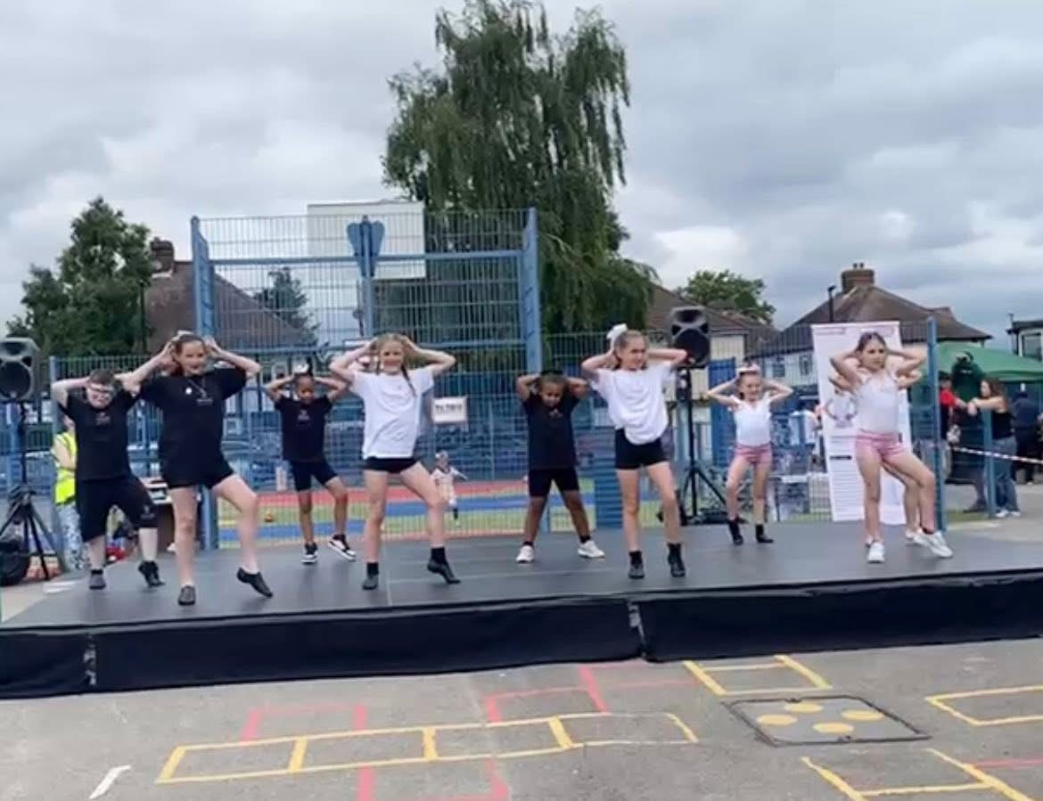 Pinnacle dancers performing together on stage